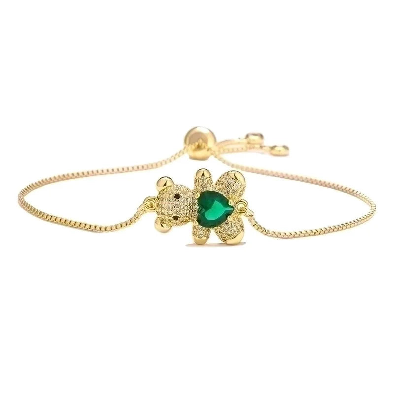 Gouden beertjes armband met gekleurd steentje groen