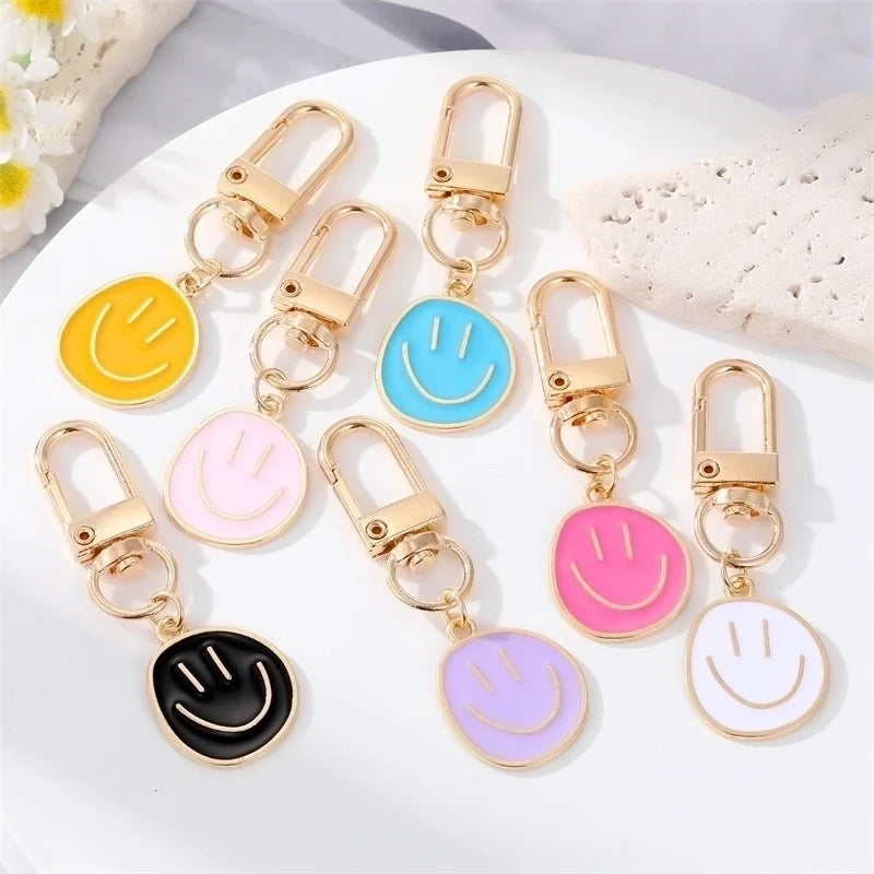 Smiley sleutelhanger wit