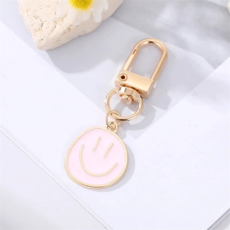 Smiley sleutelhanger rose