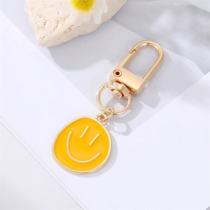 Smiley sleutelhanger geel