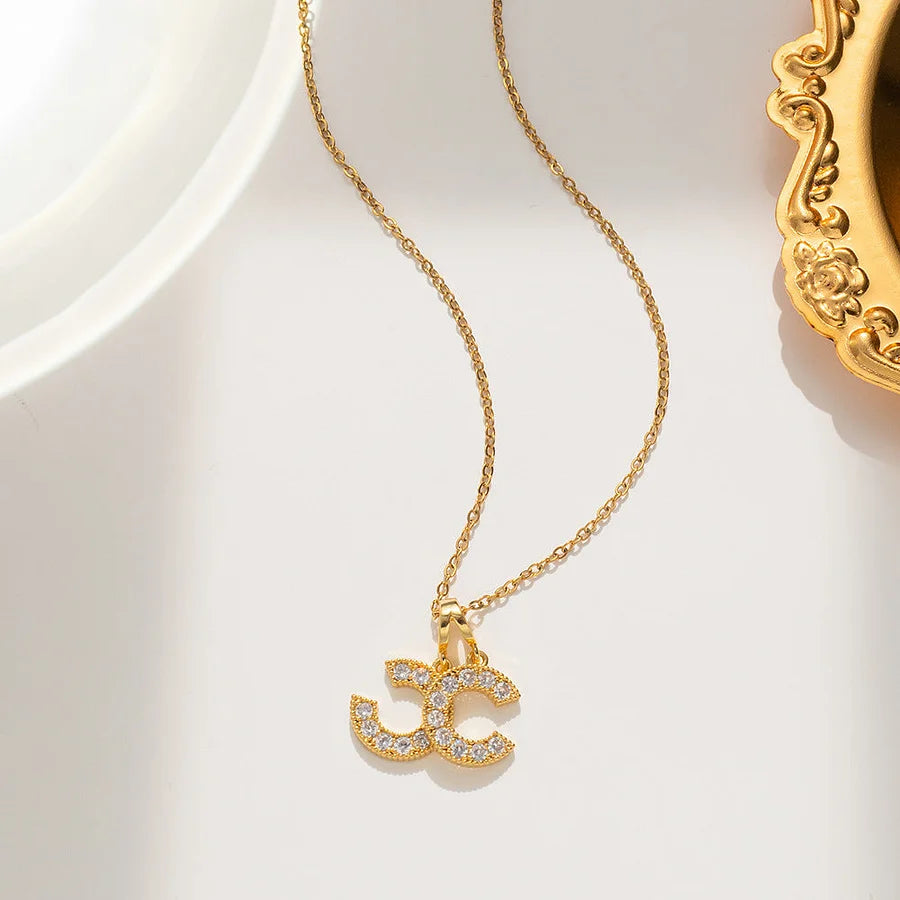 Gouden ketting dubbel hangertje